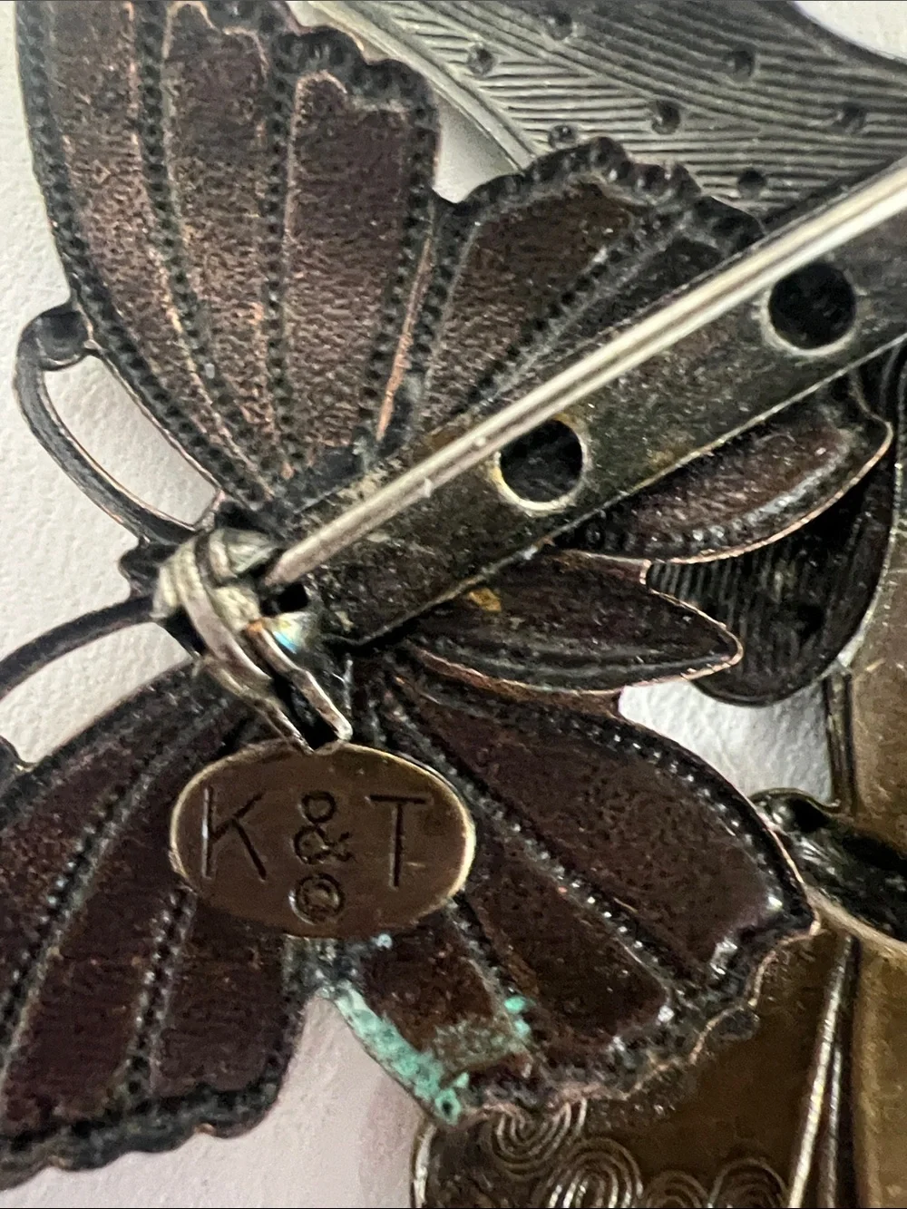 Vintage K & T brooch. Copper, silver, and bronze tone butterfly brooch